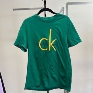 Calvin Kliein green and yellow shirt size medium